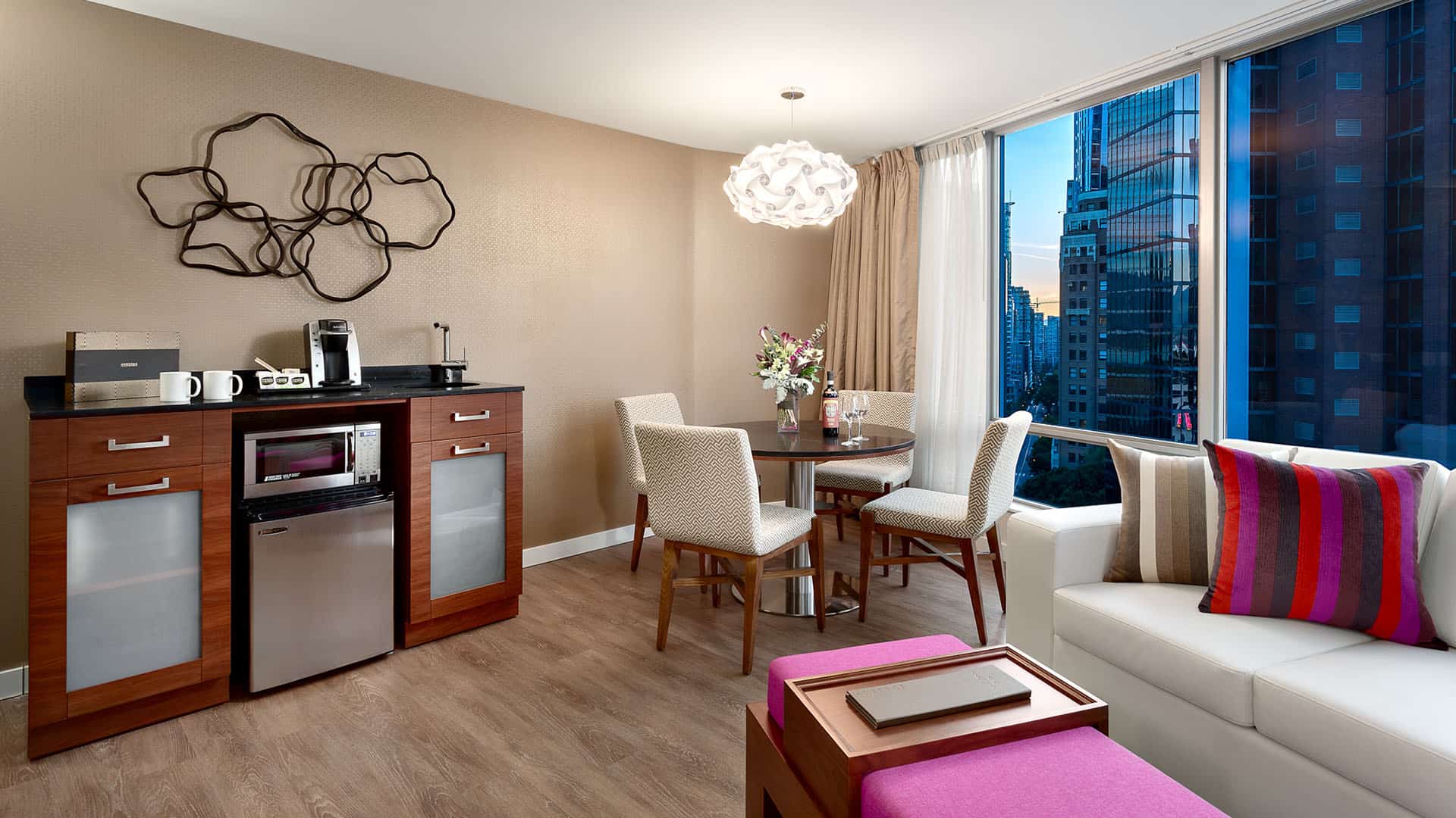 Auberge Suite Kitchenette, Dining Area and Living Room Area With City Views