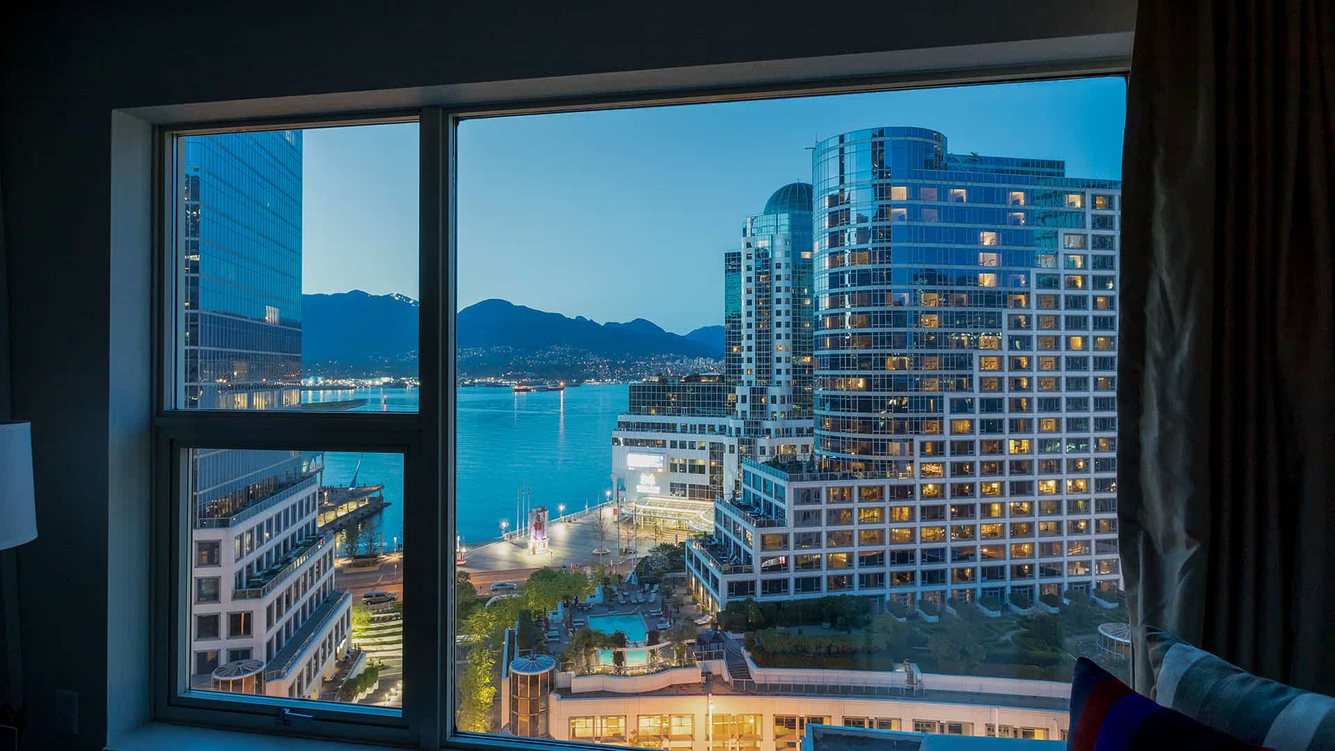 Vancouver Convention Centre, Coal Harbour, and North Shore Mountains at Night